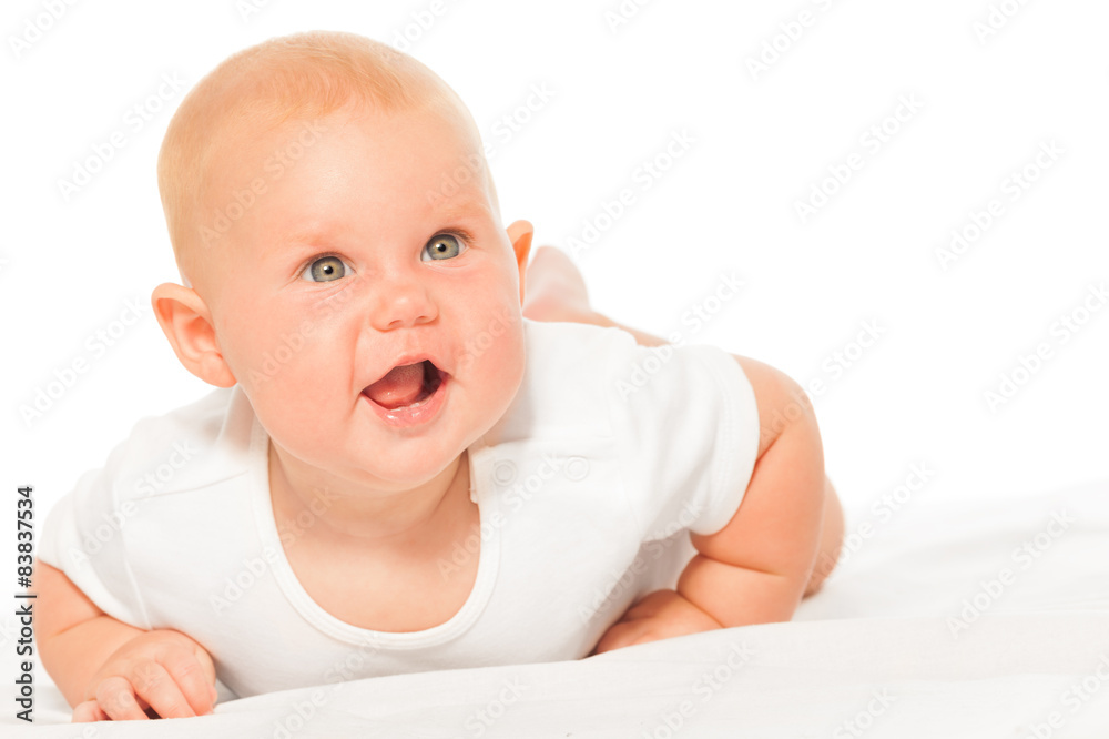 Chubby baby in bodysuit on white background crawls Chubby baby in bodysuit on white background crawls