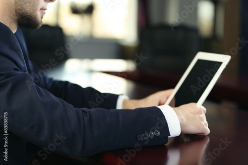Businessman working with ta...