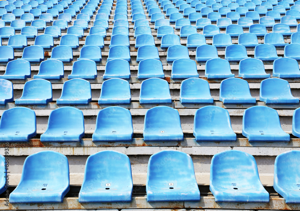 Naklejka premium Empty blue seats in stadium