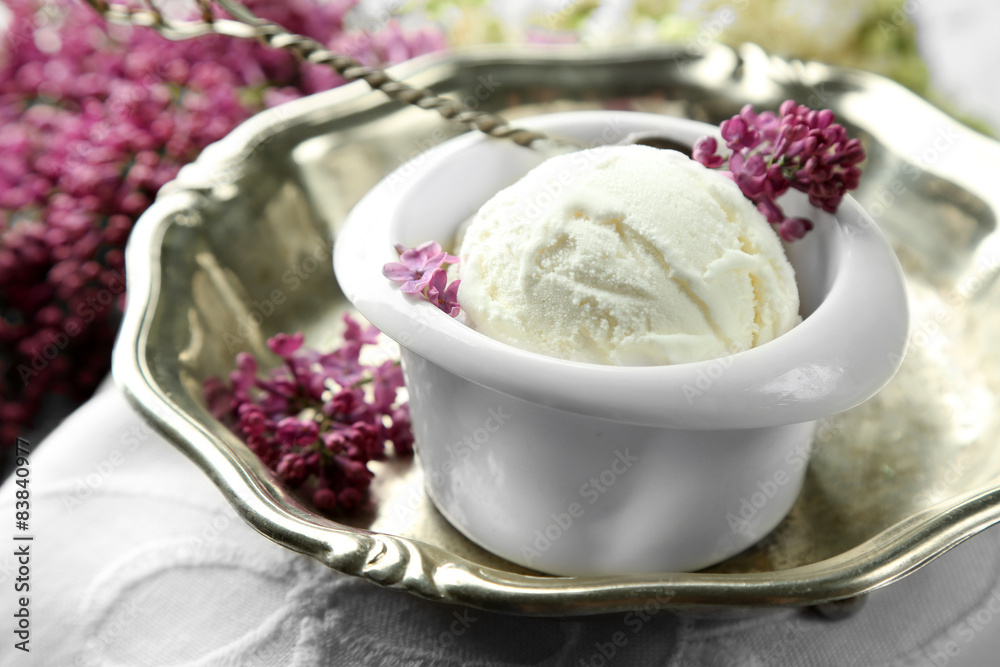 Beautiful composition with tasty ice cream and lilac flowers Beautiful composition with tasty ice cream and lilac flowers