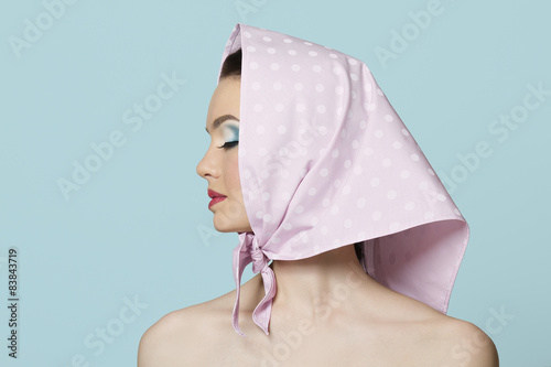 portrait of beautiful woman with kerchief and perfect makeup.