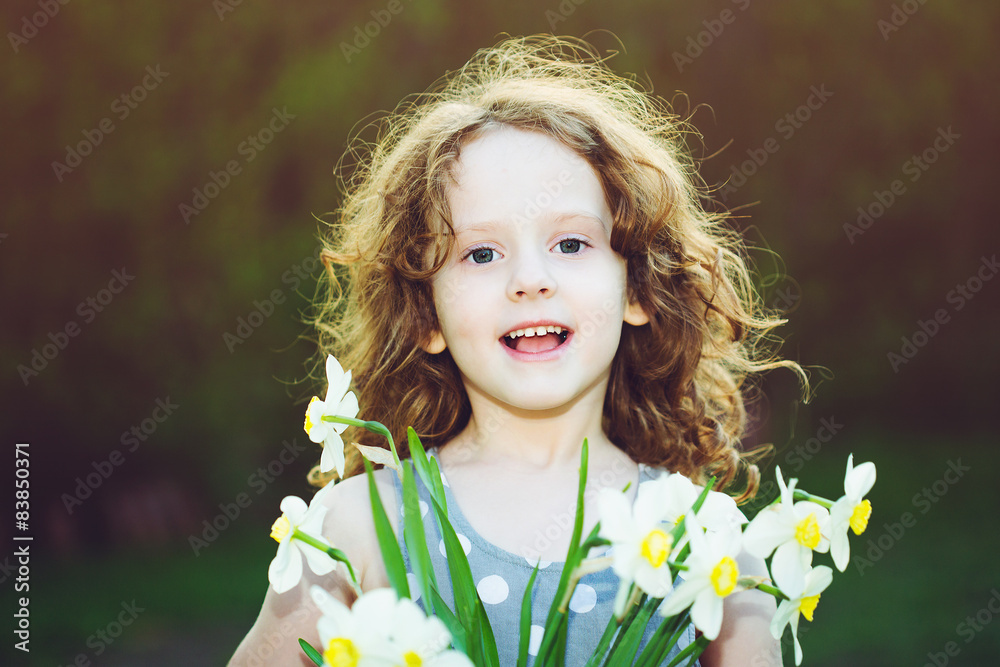 Little girl with a flower in her hand. Mothers day concept. Little girl with a flower in her hand. Mothers day concept.
