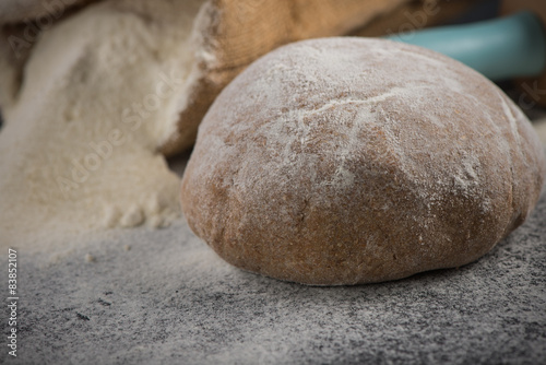 Wholegrain dough for homemade bread, food baking background