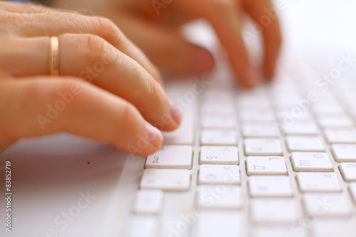Closeup of typing male hands