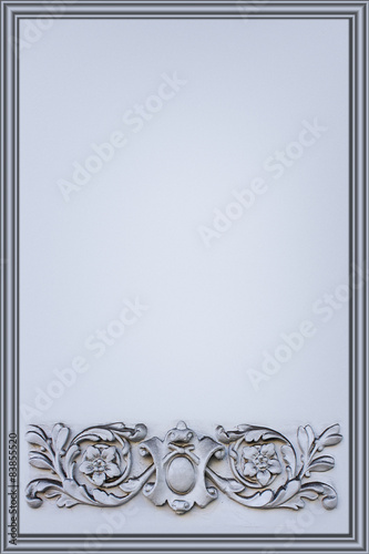 verticall gray background decorated with a bas-relief photo