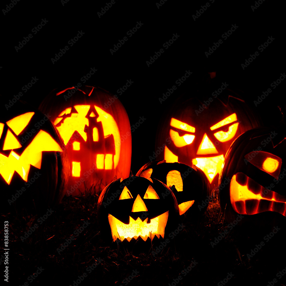 Fototapeta premium Halloween pumpkin head jack lantern with scary evil faces spooky