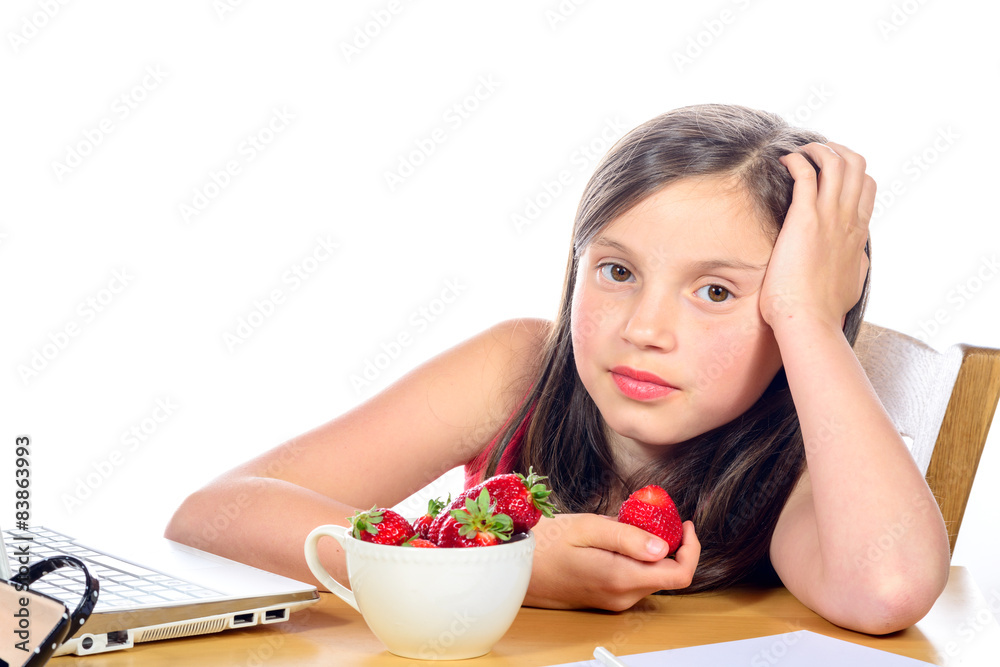 a little girl eating a strawberry a little girl eating a strawberry