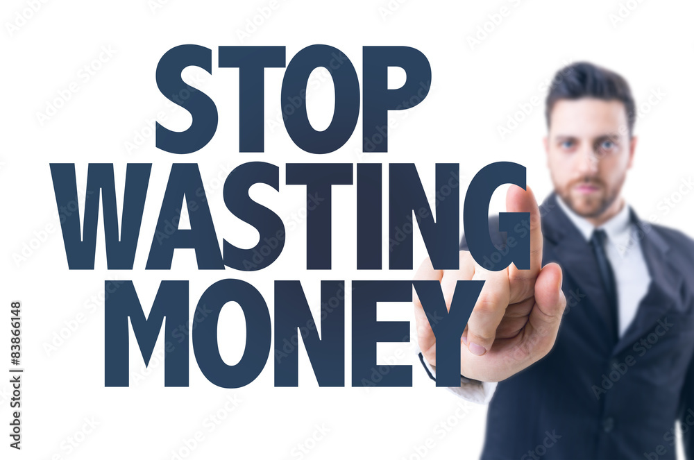 Business man pointing the text: Stop Wasting Money Business man pointing the text: Stop Wasting Money