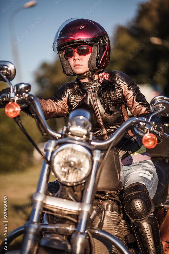 Biker girl on a motorcycle Biker girl on a motorcycle