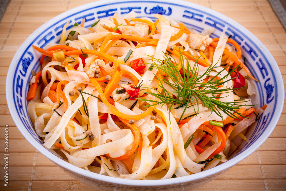Asian rice noodle with chicken meat and carrots Asian rice noodle with chicken meat and carrots