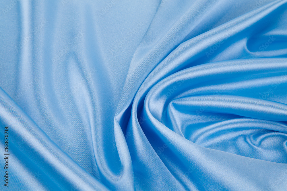 Obraz premium Blue silk cloth texture closeup.