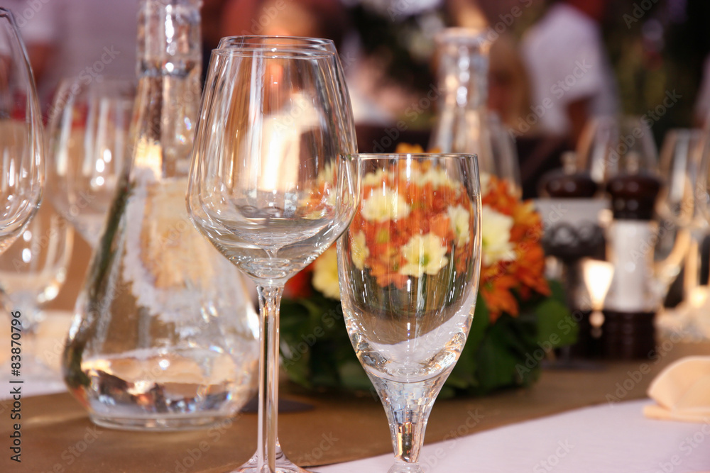 wineglasses setting on the arranged table in the restaurant