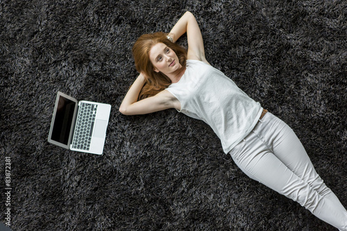 Woman laying on the carpet