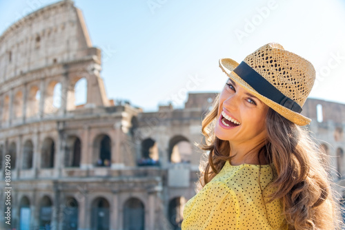 Photography Portrait of laughing woman at Colosseum in Rome in summer