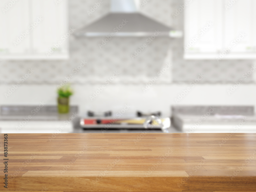 Empty wooden table and blurred kitchen background Stock Photo | Adobe Stock
