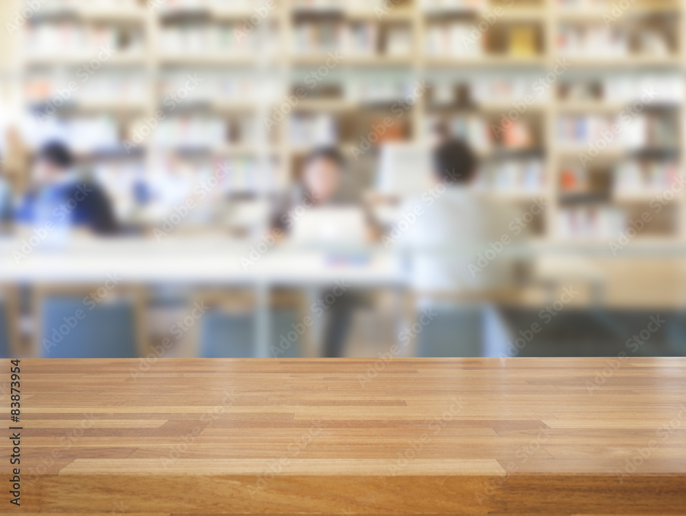 Empty wooden table and modern library background Empty wooden table and modern library background