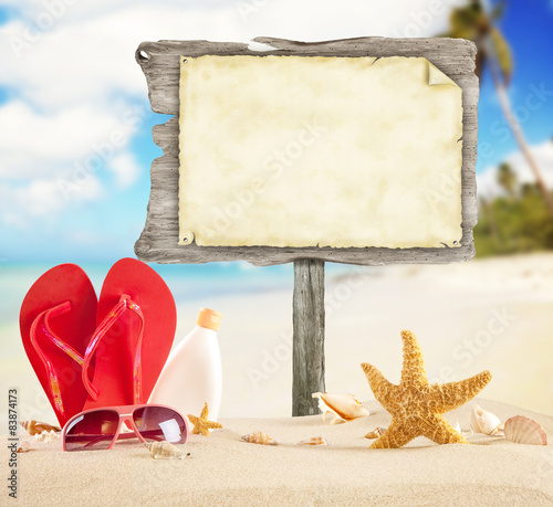 Fototapeta Naklejka Na Ścianę i Meble -  Summer beach with blank wooden poster