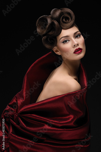 Girl in red texturized fabric