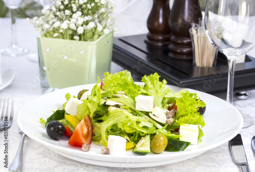 Greek salad on a table in a restaurant