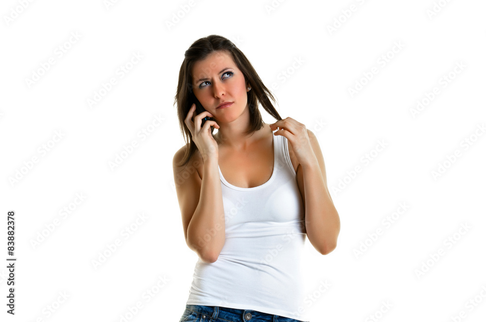 Beautiful young woman with white top talking to the phone Beautiful young woman with white top talking to the phone