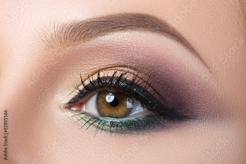 Fototapeta Naklejka Na Ścianę i Meble -  Close-up of woman's eye with creative modern make-up