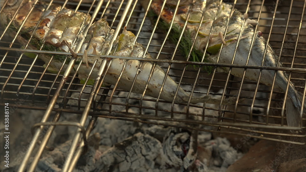 Hot fish on a grilling pan Hot fish on a grilling pan