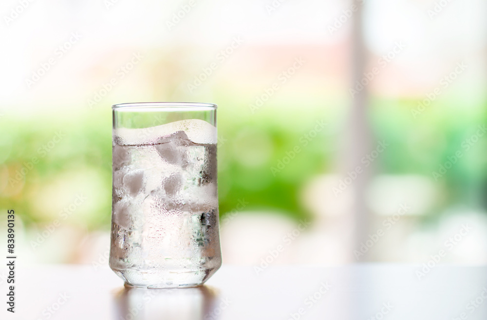 glass of Cool fresh drink with ice cube on the table glass of Cool fresh drink with ice cube on the table