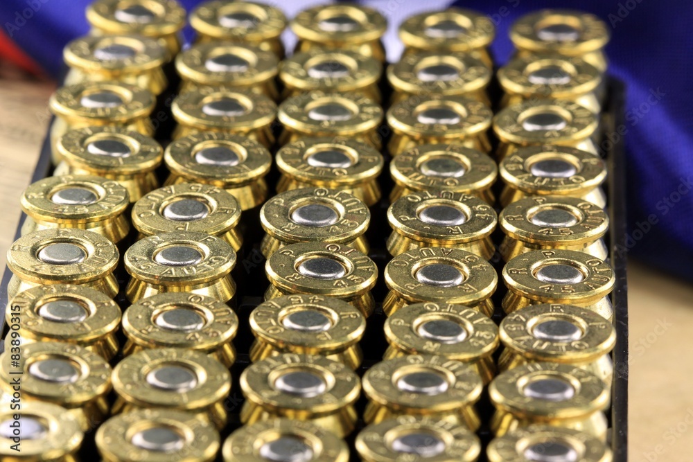 A row of 45 caliber ammunition copper plated bullets