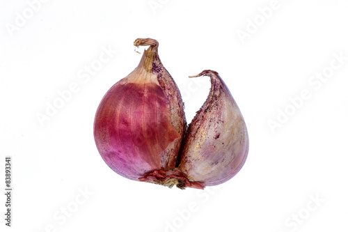 Thailand small red onion on a white background.