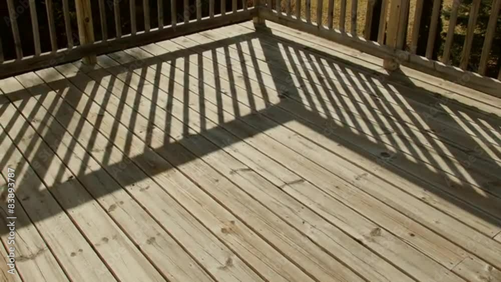 Time Lapse Shadows Moving Across Wooden Deck in Back Yard Time Lapse Shadows Moving Across Wooden Deck in Back Yard