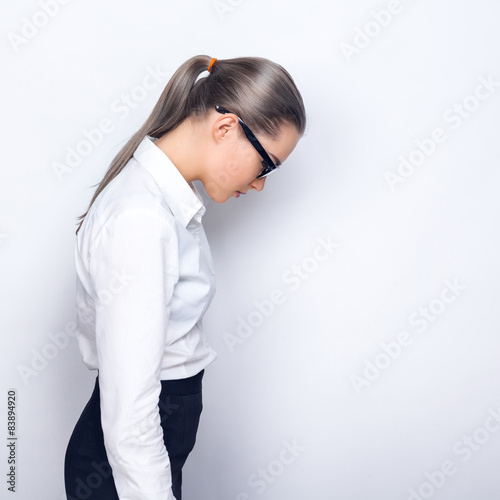 Young business woman in glasses