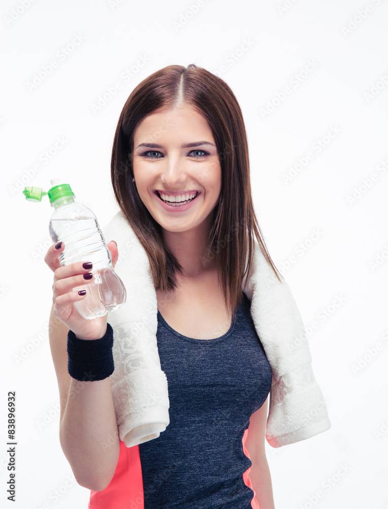 Smiling fitness woman holding bottle of water Smiling fitness woman holding bottle of water