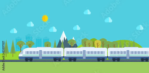 Train on railway with forest and mountains background.