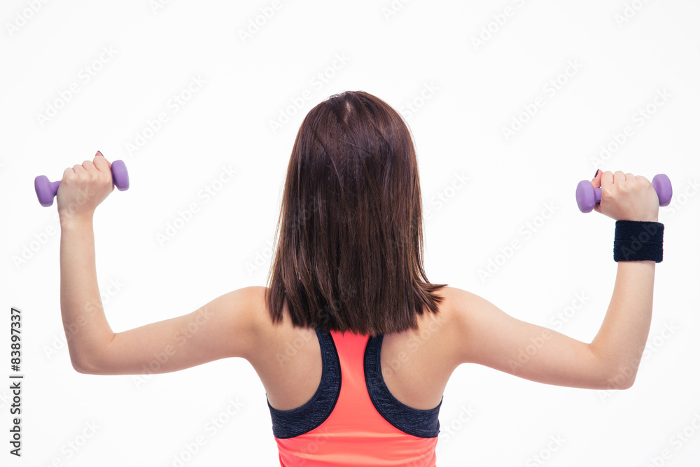 Fitness woman working out with dumbbells Fitness woman working out with dumbbells