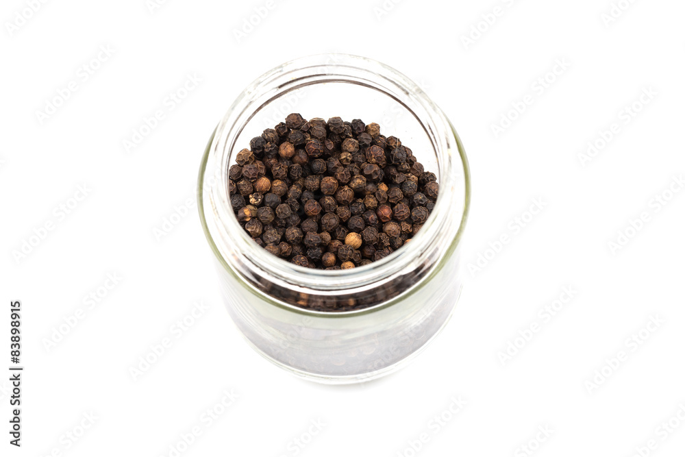 Black pepper in glass bottle Black pepper in glass bottle