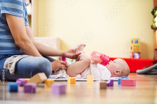 Young father with his cute baby daughter inside