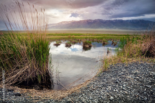 Lake at mountains in Kazakhstan photo