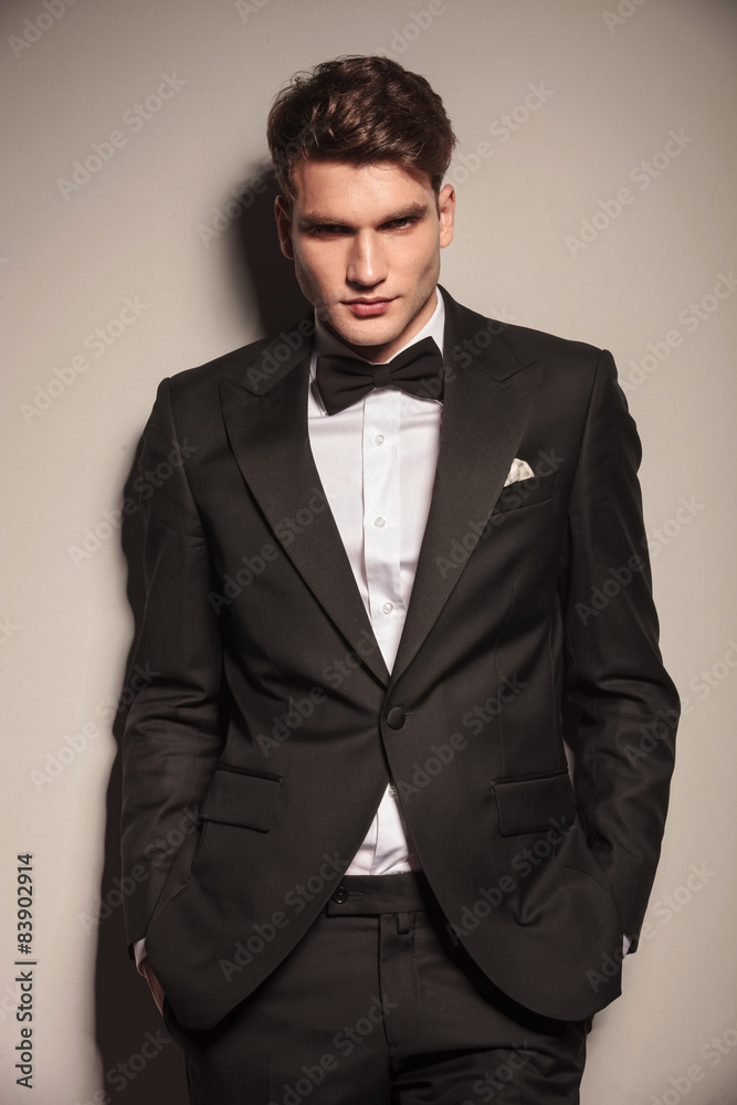 young business man holding his hands in pockets