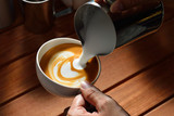 Making of cafe latte art,tulip shape
