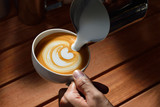Making of cafe latte art,tulip shape