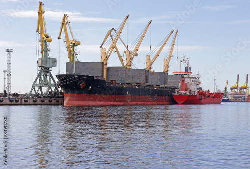 unloading of cargo ship and replenishing it with fuel 