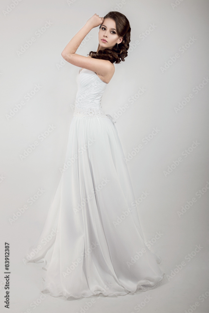 Portrait of a beautiful woman in a wedding dress in the image of Portrait of a beautiful woman in a wedding dress in the image of