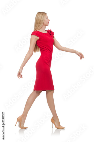 Blond woman in scarlet dress isolated on white