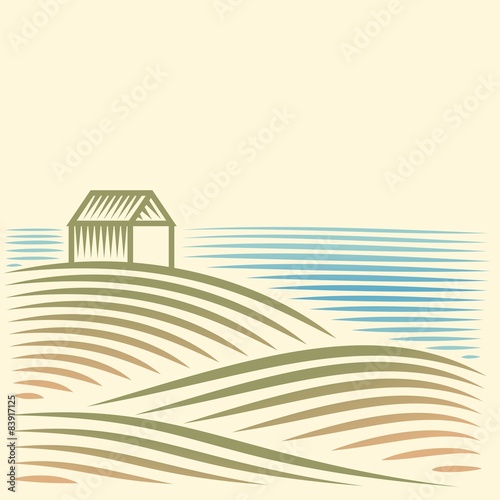 Rural landscape with a house by the sea