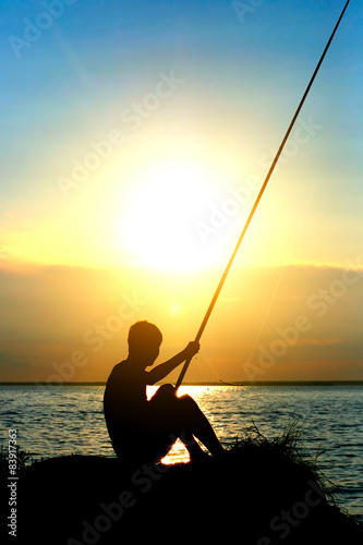 Fisher Silhouette at Sunset