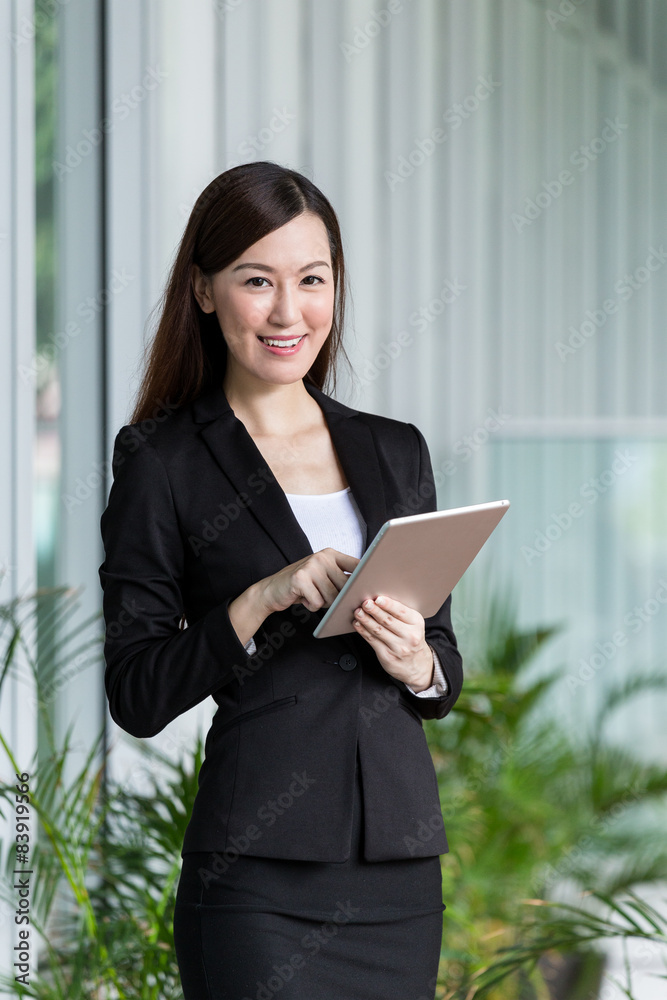 Businesswoman use of digital tablet Businesswoman use of digital tablet