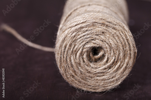 skein of twine on a brown background