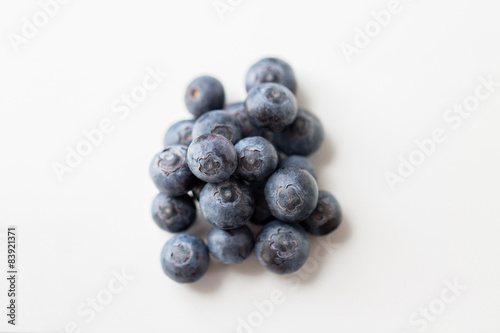 juicy fresh ripe blueberries on white