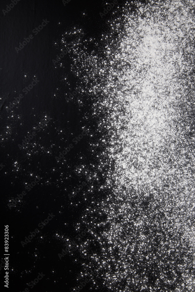 Flour on a black background. Culinary galaxy Flour on a black background. Culinary galaxy