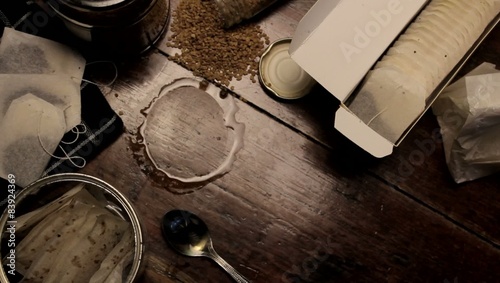 Male hands hold cup of coffee .